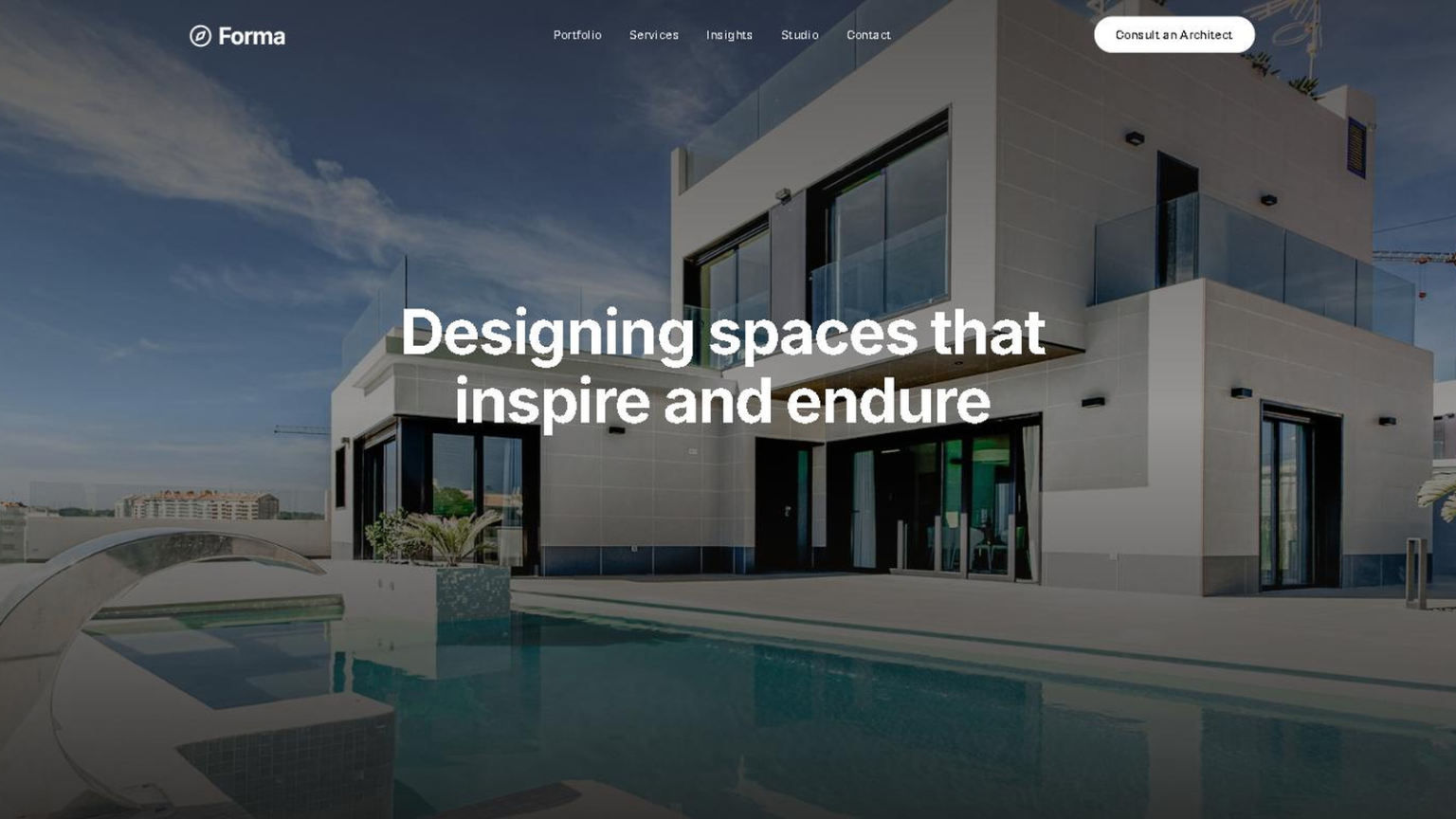 Architecture and interiors studio website concept, shown in full: a modern house photographed at dusk beneath the headline ‘Designing spaces that inspire and endure’